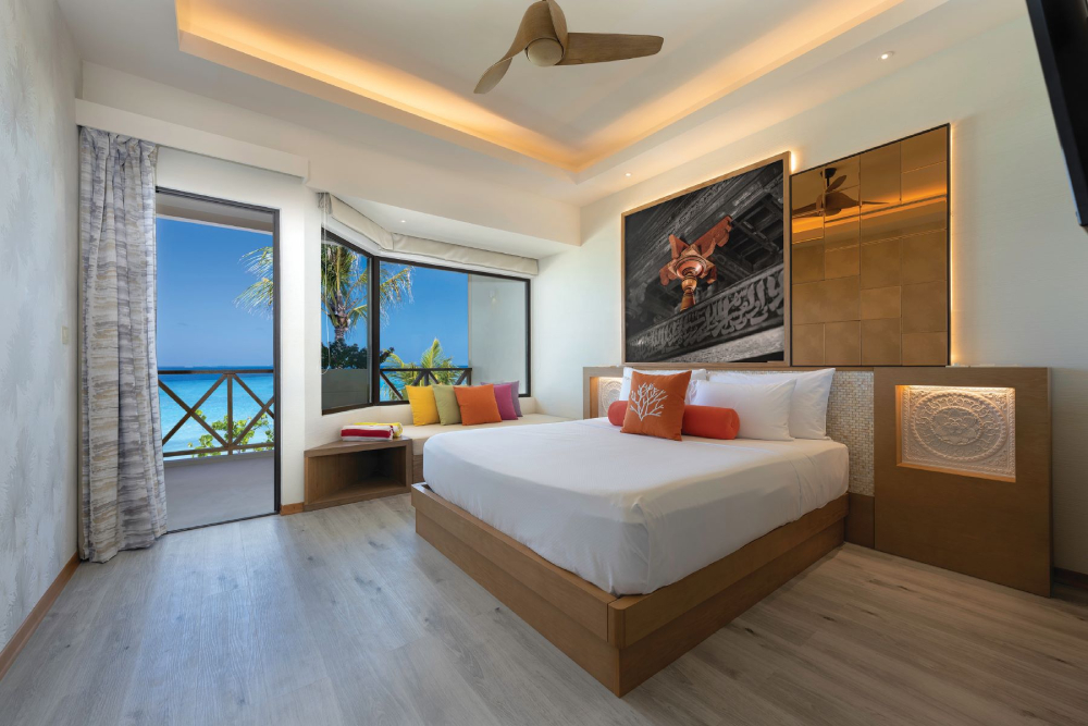 OBLU XPERIENCE AILAFUSHI - OCEAN VIEW FAMILY ROOM - BEDROOM WITH VIEW.jpg